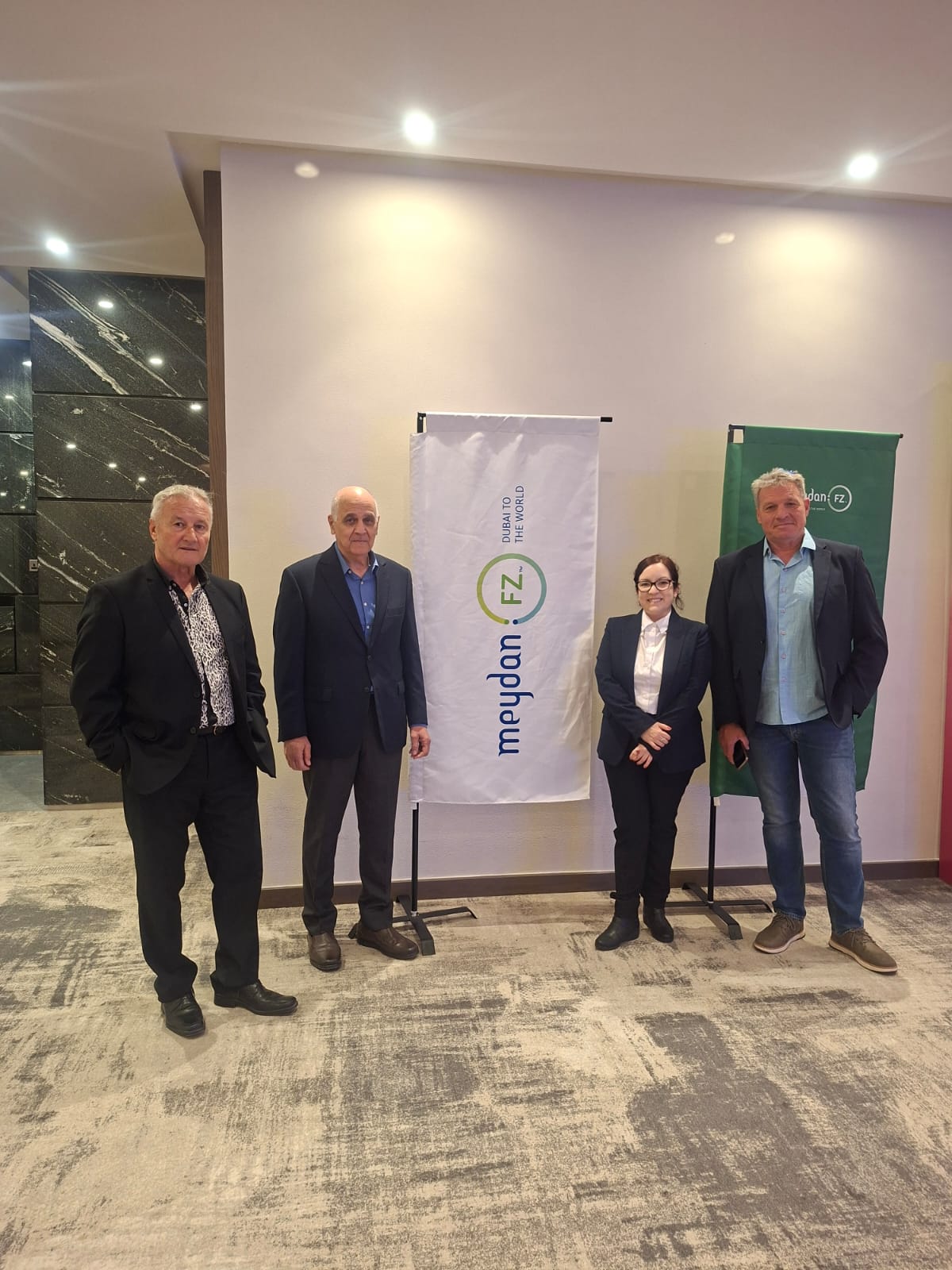 Maktub team with local business partners in UAE